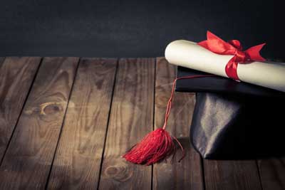 graduation cap and diploma