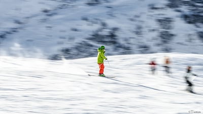 skier coming down ski slope