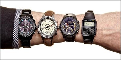 wrist with four different watch types