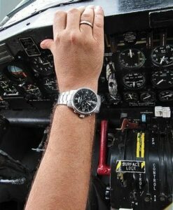 pilots wristwatch in cockpit