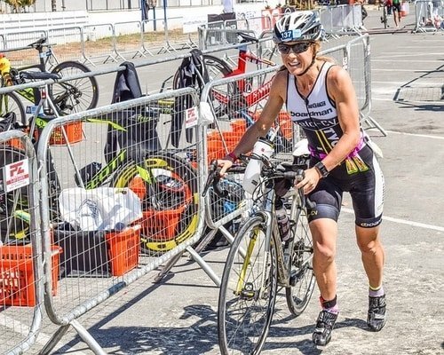 triathlon woman with bike