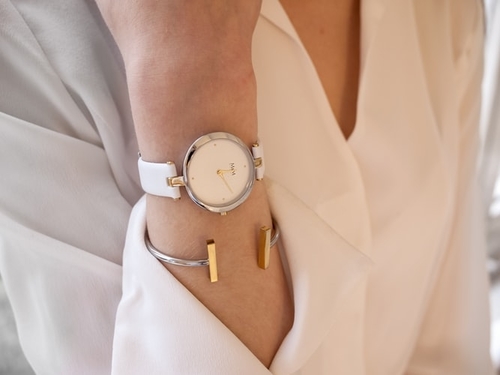 A stylish woman wearing an expensive looking women's watch