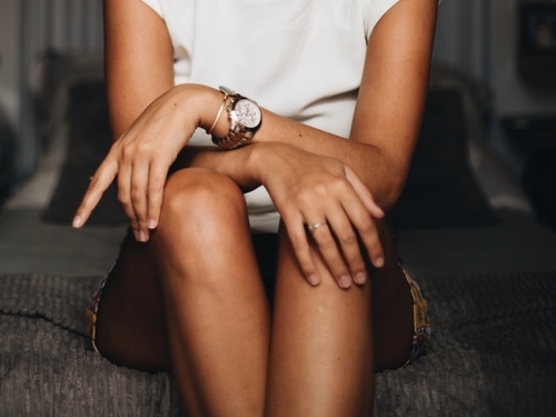 Photo of a stylish woman wearing an elegant watch