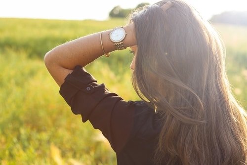 young woman with wristwatch