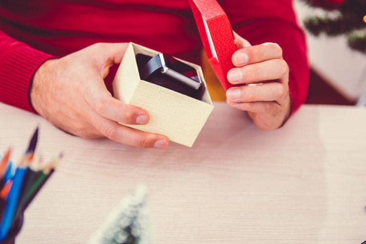 Man opening a gift box