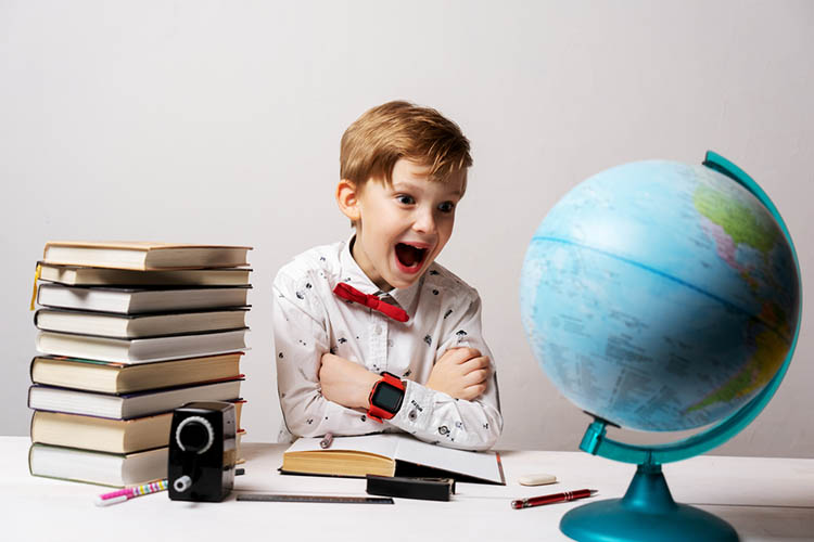 boy studying geography