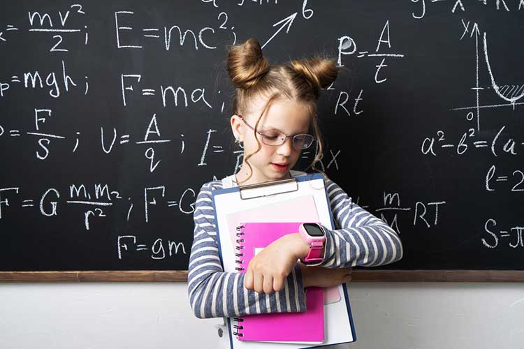 Student Girl with a smart watch in the classroom