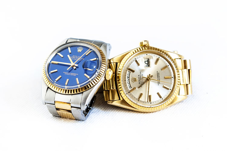 Rolex Oyster Perpetual Day- Date and Oyster Blue watch on white