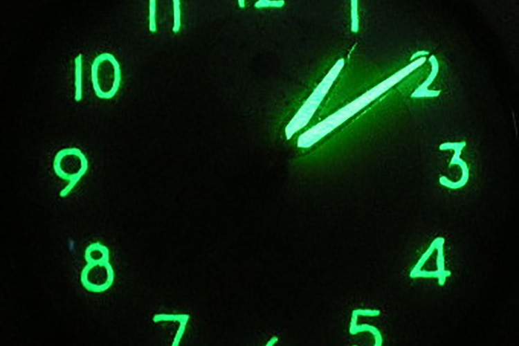 Radioluminescence. A 50's Radium Dial, previously exposed tu UV-A light